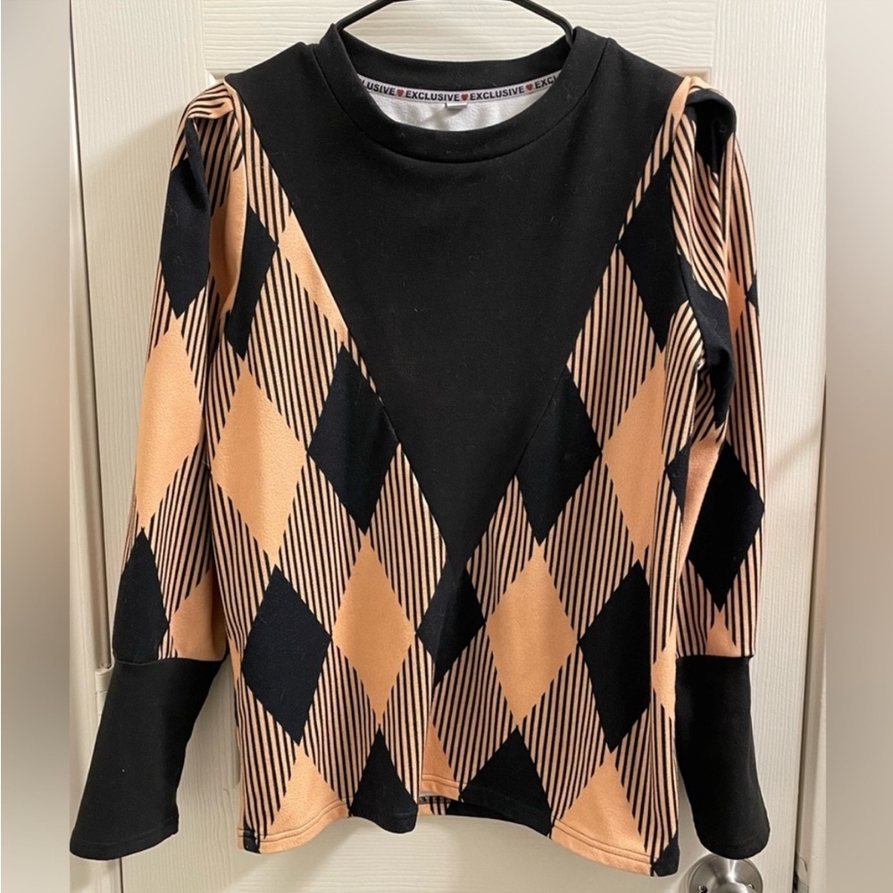 Puff sleeve women’s peachy orange and black sweater top, diamond pattern